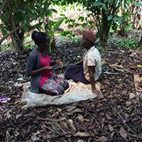 Study field team member conducts an interview. Photo by Rashid Muyingo