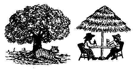 two people sitting under the shade as an animal rests under the tree shade